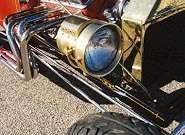 Polished brass headlight buckets and radiator