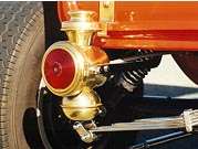 Polished brass tailights and a chromed leaf spring